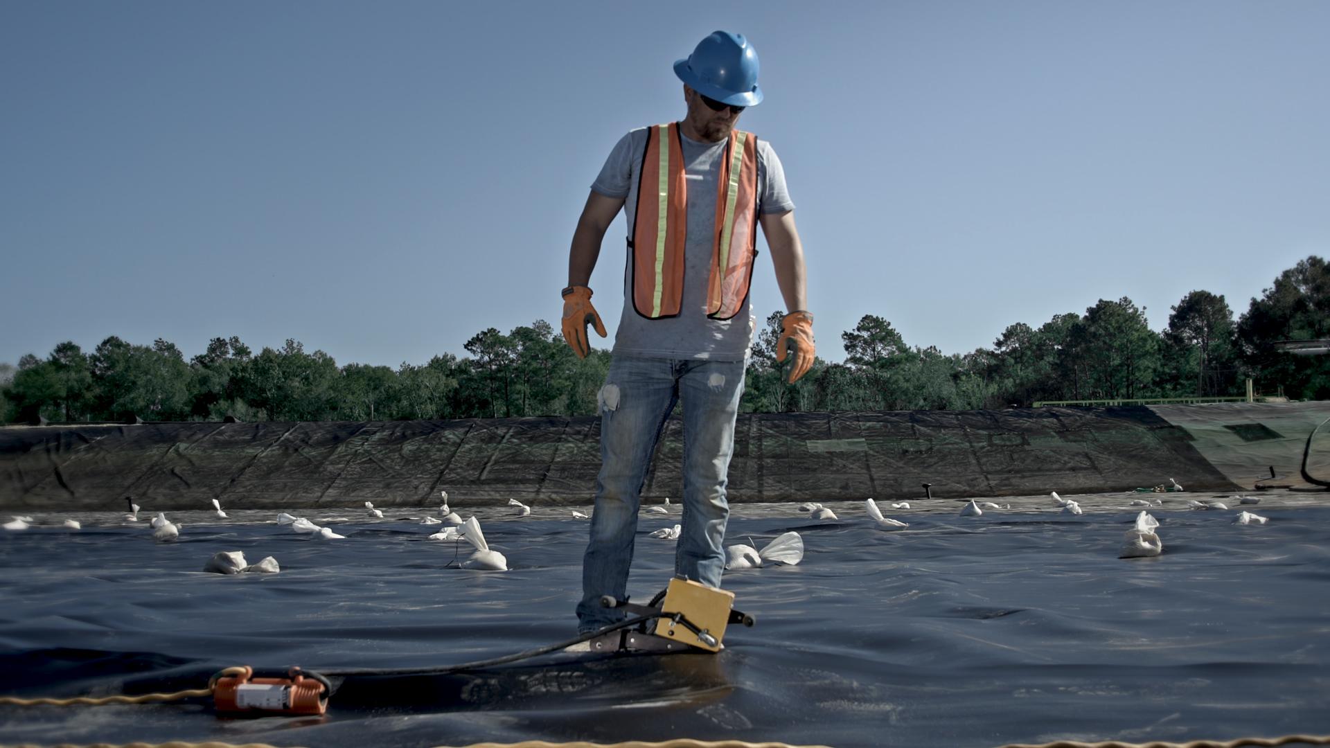 Identify and repair three geomembrane holes