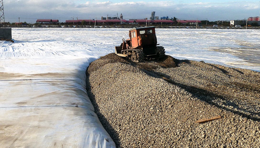 Learn how to effectively close sludge ponds using geotextile reinforcement with our step-by-step guide, ensuring environmental safety and compliance.