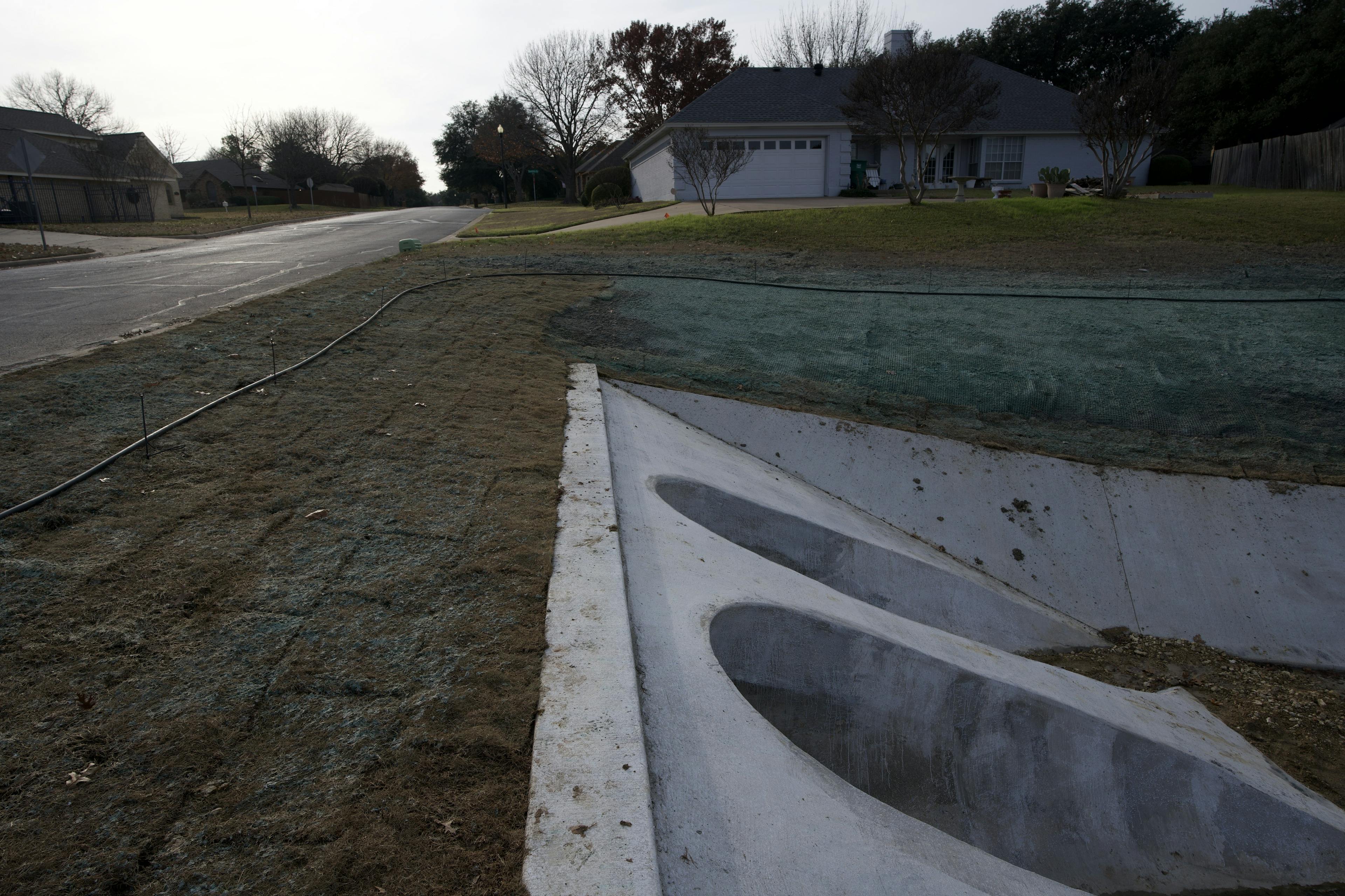 Securing the concrete outfalls to redirect water flow