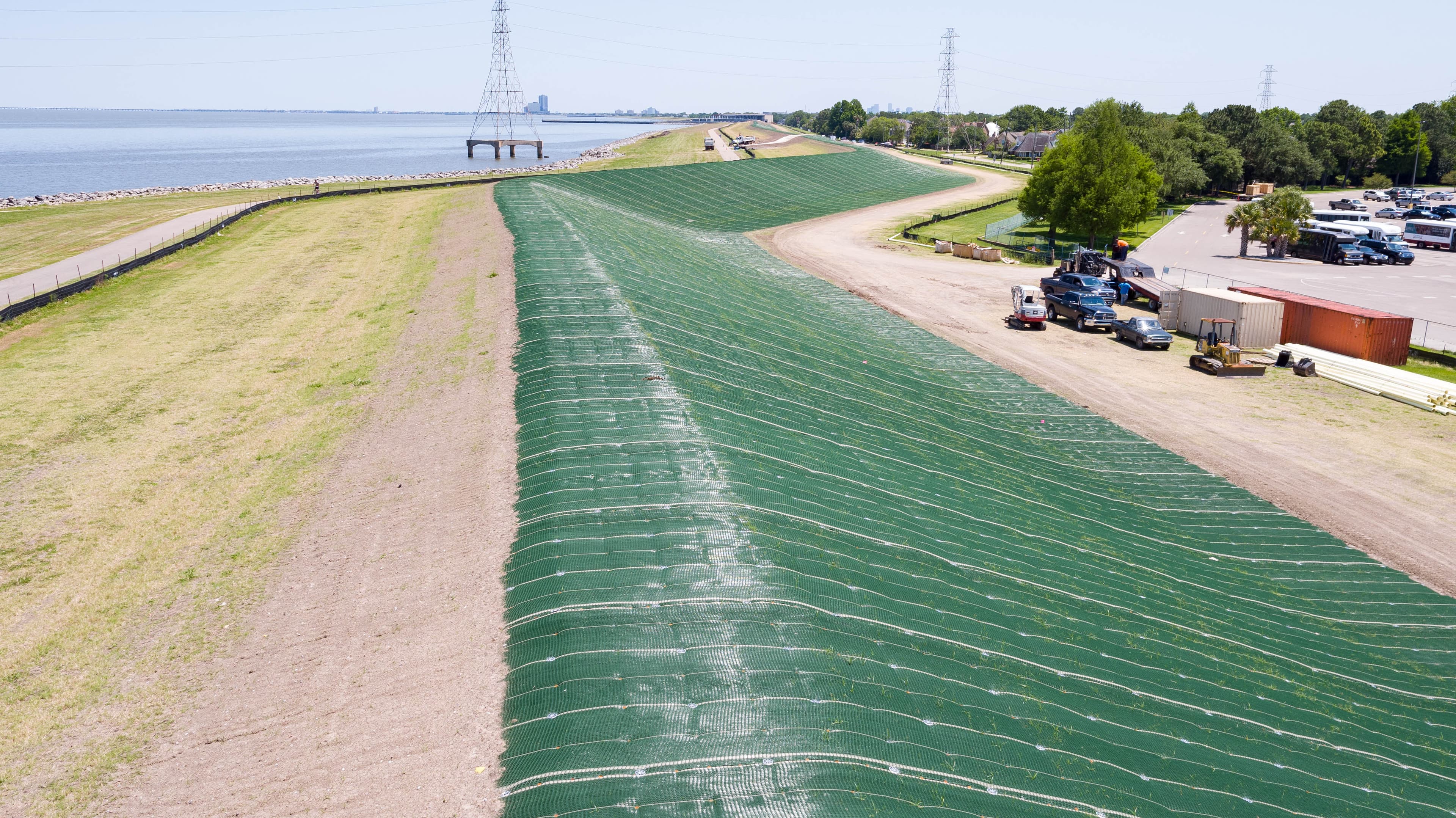 Louisiana's levee system is protected by resilient flood mitigation strategies, such as the PROPEX Armormax system, which reinforces levees against storm surges and reduces the risk of breaches, proven effective during hurricanes like Ida.